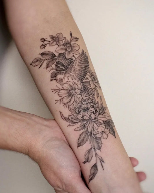 Medium Blackwork Sparrow and Peonies Tattoo on Women Arm by @yulight_tattoo