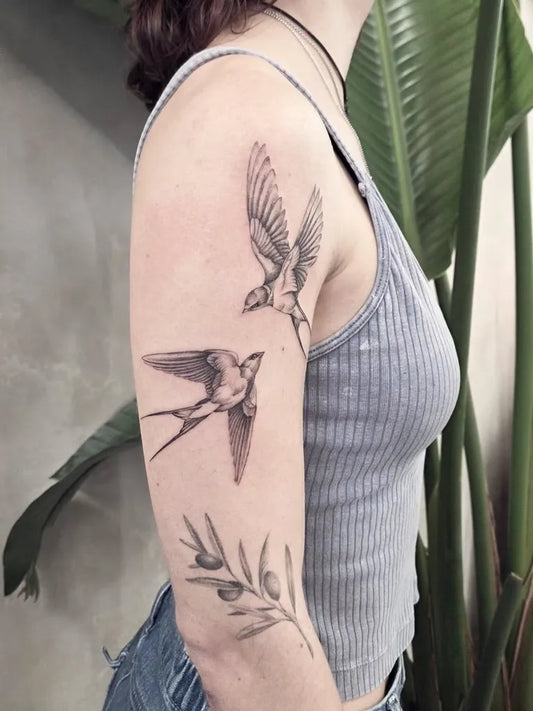 Medium Blackwork Sparrows and Olive Branch Tattoo on Women Arm by @lexijimeneztattoo