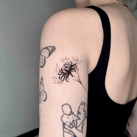 Medium Blackwork Spider Lily Butterflies Tattoo on Women Shoulder by @hwana.tt
