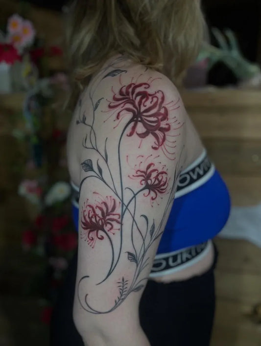 Medium Blackwork Spider Lily Red and Stems Women Shoulder by @tattoo.fauve