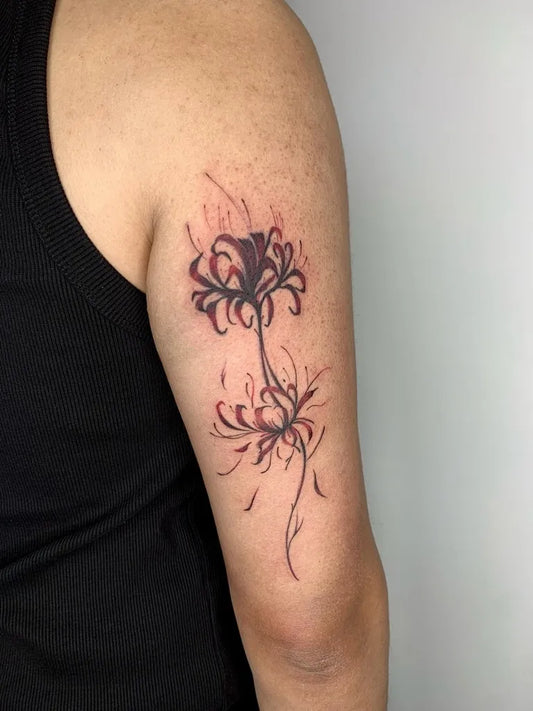 Medium Blackwork Spider Lily Tattoo on Men Arm by @narii.tattoos