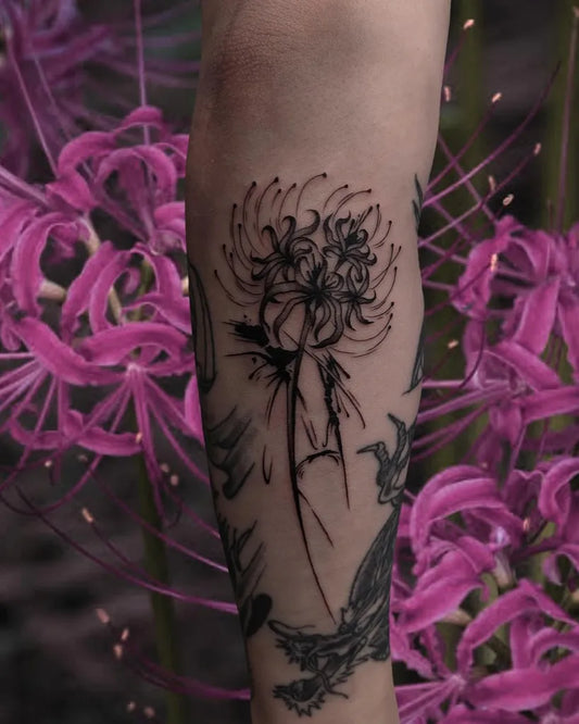 Medium Blackwork Spider Lily Tattoo on Women Arm by @dwd.shinigami