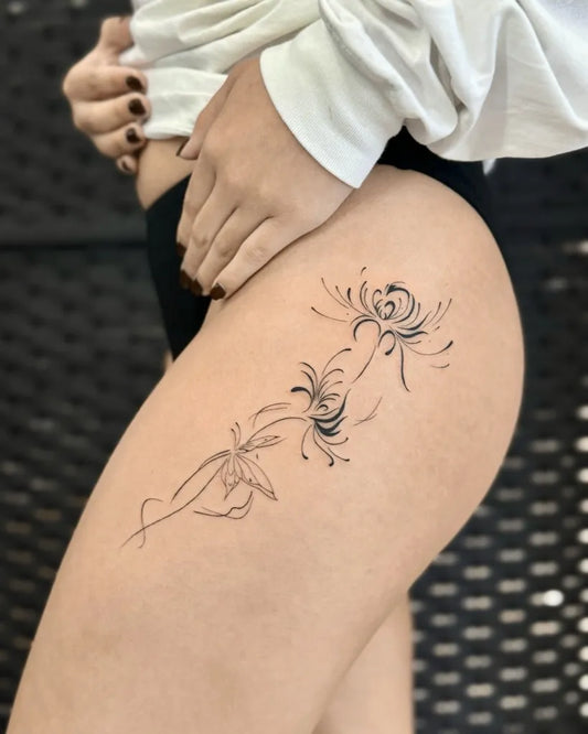 Medium Blackwork Spider Lily Tattoo on Women Hip by @baronarttattoo