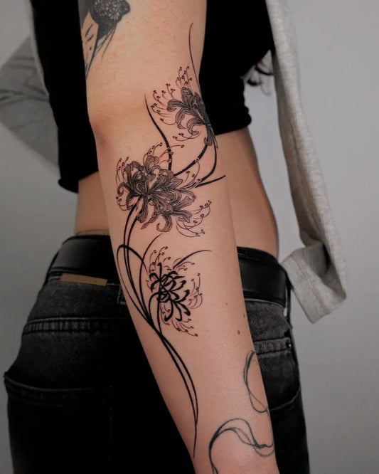 Medium Blackwork Spider Lily black Tattoo on Women Arm by @nuga_ttt