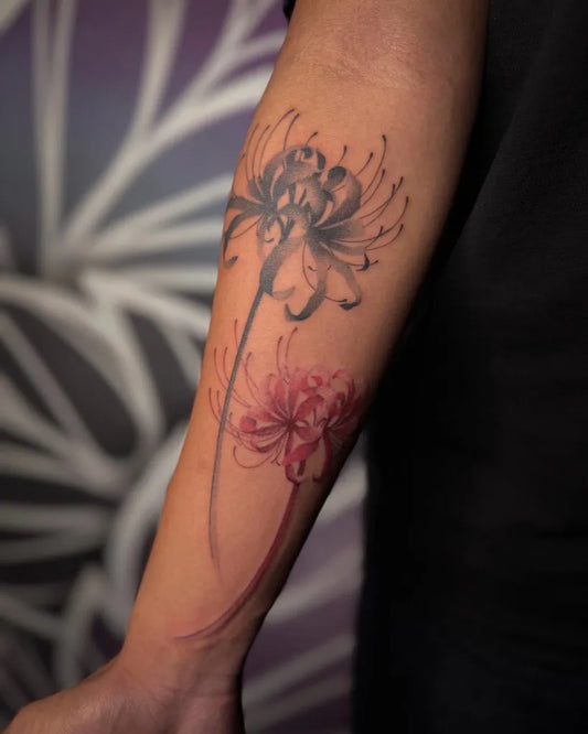 Medium Blackwork Spider Lily black and red Tattoo on Women Arm by @anttt.tattoos