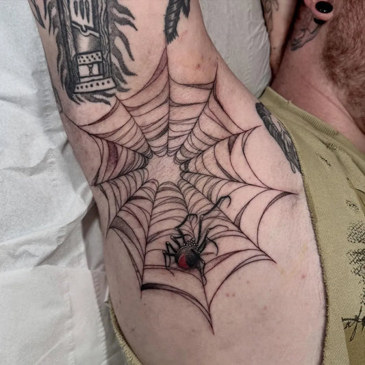 Medium Blackwork Spider Web and Spider on Men Arm Tattoo by @abbiejohnstontattoo