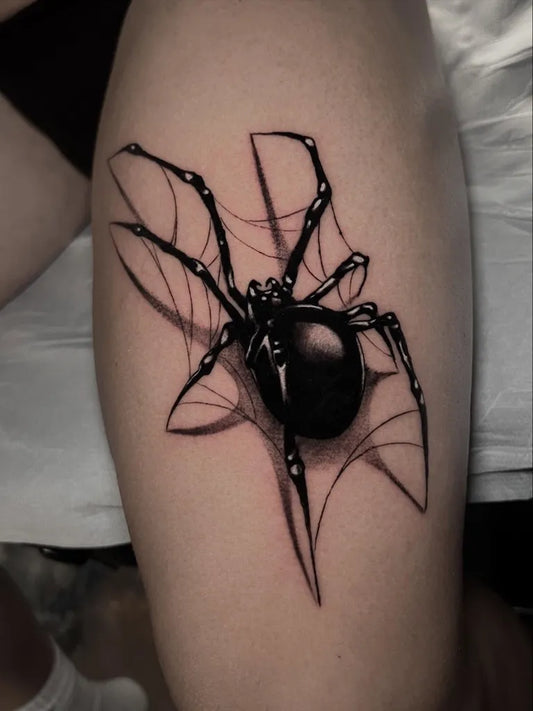 Medium Blackwork Spider Web on Women Thigh Tattoo by @luigigala.tattoo