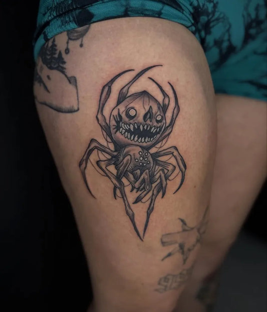 Medium Blackwork Spider on Women Thigh Tattoo by @nathanchubbsink