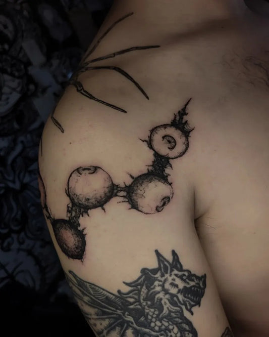 Medium Blackwork Spiky Orbs Tattoo on Men Shoulder by @viktorcarnage