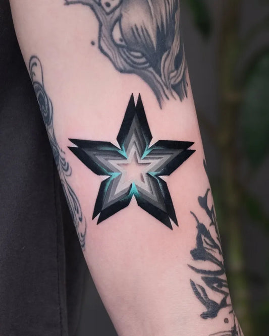Medium Blackwork Star Tattoo on Women Arm by @inktattoo_mieko
