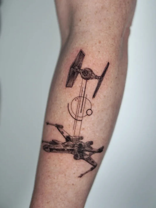 Medium Blackwork Star Wars TIE Fighter X Wing Tattoo on Men Arm by @lolamiku.tattooist