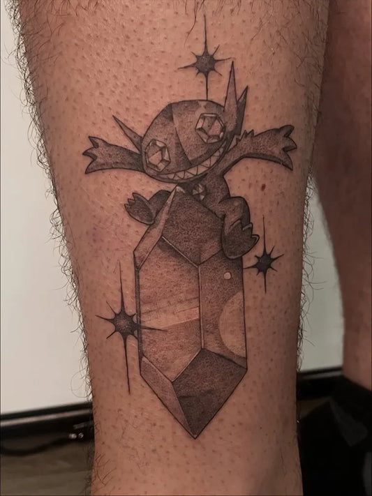 Medium Blackwork Stitch Pokemon Tattoo on Men Leg by @tm.jared.tattoos