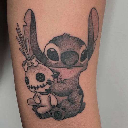 Medium Blackwork Stitch and VoodooDoll Tattoo on Women Arm by @karaalexistattoo