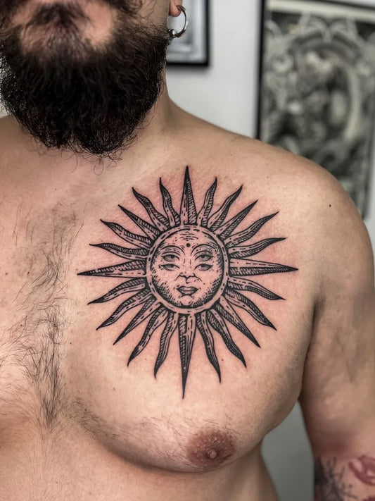 Medium Blackwork Sun Face on Men Chest Tattoo by @konna_x_tattoo