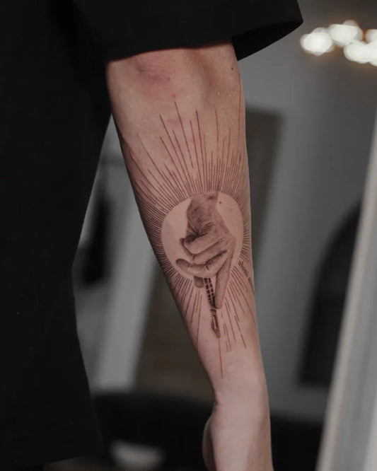 Medium Blackwork Sun Hand on Men Arm Tattoo by @bastian_fineline