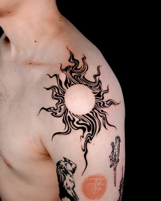 Medium Blackwork Sun Lion Dagger on Men Shoulder Tattoo by @you.tats