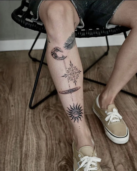 Medium Blackwork Sun Moon Flower Tattoo on Women Thigh by @vanngucci.cncpts