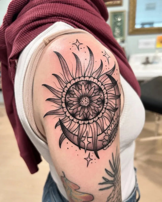 Medium Blackwork Sun Moon Mandala on Women Shoulder Tattoo by @carrieblacktattoo
