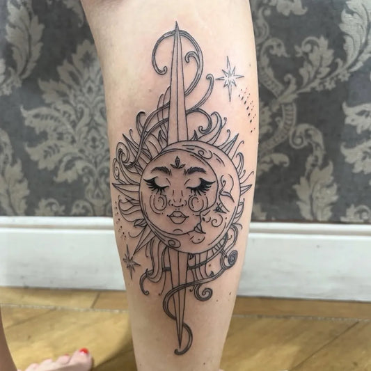 Medium Blackwork Sun Moon Sword on Women Leg Tattoo by @beautifullyinkedstudio