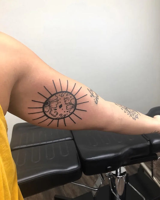 Medium Blackwork Sun Tattoo on Women Inner Arm by @bushidostudioaz