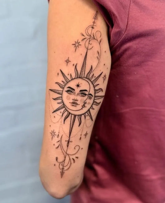 Medium Blackwork Sun and Moon and Flowers on Women Arm Tattoo by @omen_atelier