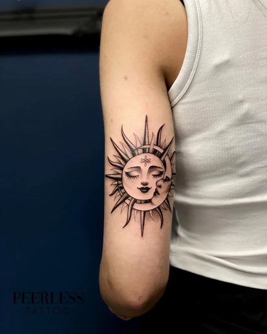 Medium Blackwork Sun and Moon on Women Arm Tattoo by @peerlesstattoo
