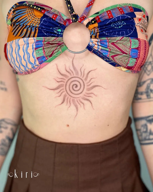 Medium Blackwork Sun on Women Chest Tattoo by @kiri.vrs