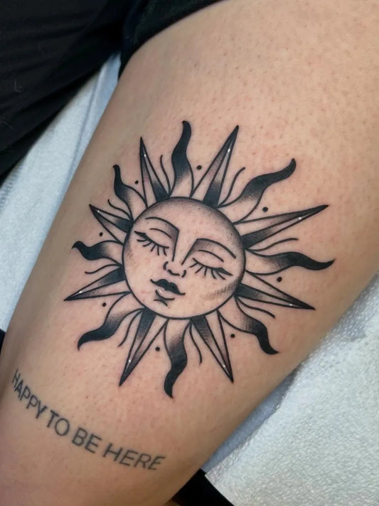 Medium Blackwork Sun with Quote on Women Thigh Tattoo by @dmagalditattoos
