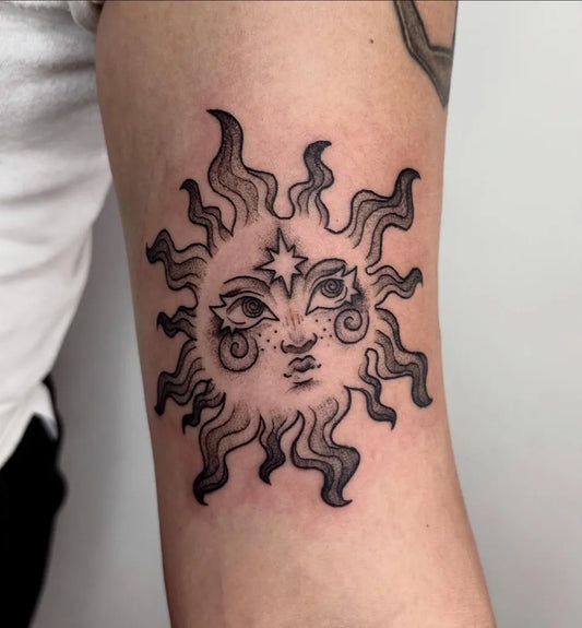 Medium Blackwork Sun with face on Women Arm Tattoo by @sleepykattatt