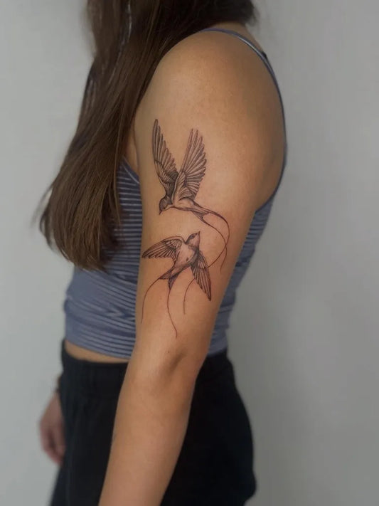 Medium Blackwork Swallows Tattoo on Women Arm by @soul_imagez_dublin