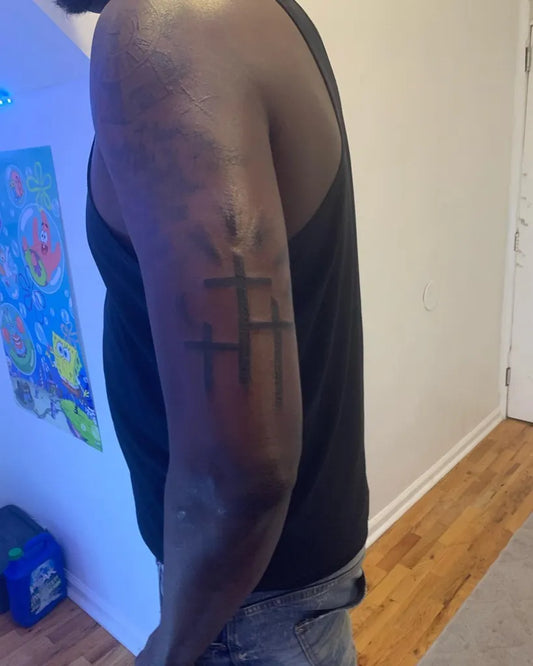 Medium Blackwork Three Crosses Tattoo on Men Arm by @inkspeaks_tattoos