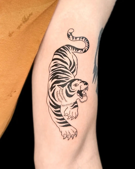 Medium Blackwork Tiger on Men Arm Tattoo by @alldaytattoobkk