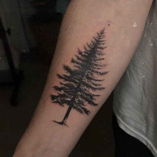 Medium Blackwork Tree Tattoo on Men Arm by @sunmi.tattoo