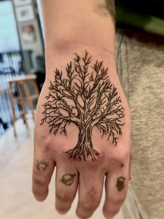 Medium Blackwork Tree Tattoo on Men Hand by @erickbritoart