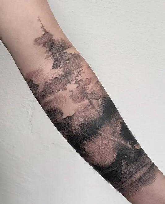 Medium Blackwork Tree and Forest Tattoo on Women Arm by @agnes.tattoo