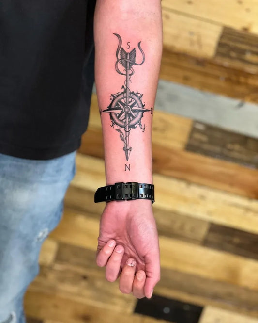 Medium Blackwork Trishula Arrow Compass Tattoo on Men Forearm by @shenoudatattoos