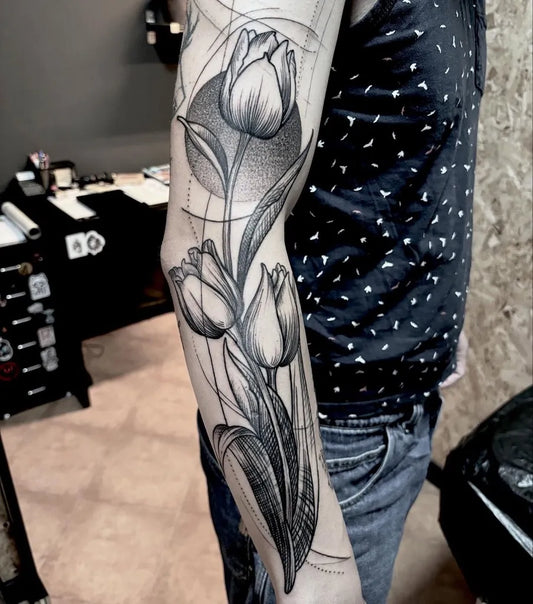 Medium Blackwork Tulip and Sun Tattoo on Men Arm by @forestink86