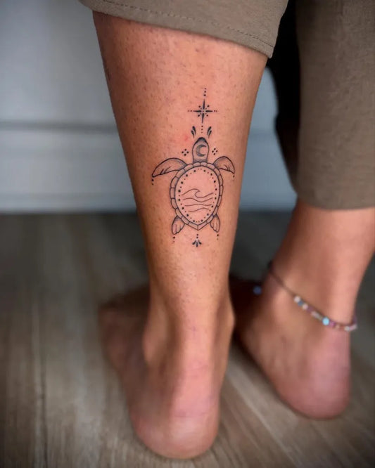Medium Blackwork Turtle with Mandala Tattoo on Women Leg by @abbylynntattoo