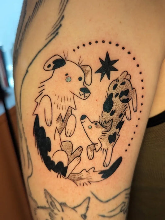 Medium Blackwork Two Dogs and Stars Tattoo on Women Arm by @lozzadraws