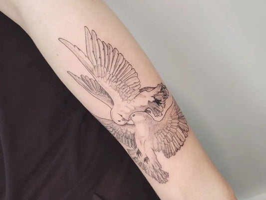 Medium Blackwork Two Doves Tattoo on Women Arm by @fayalicetattoo