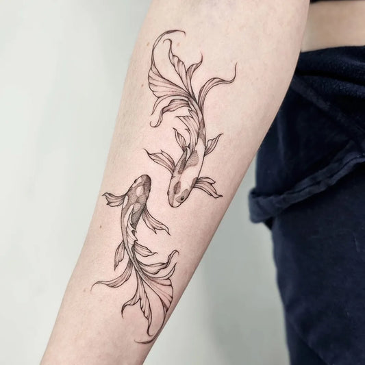 Medium Blackwork Two Koi Fish Tattoo on Women Arm by @aquarian_tattoo