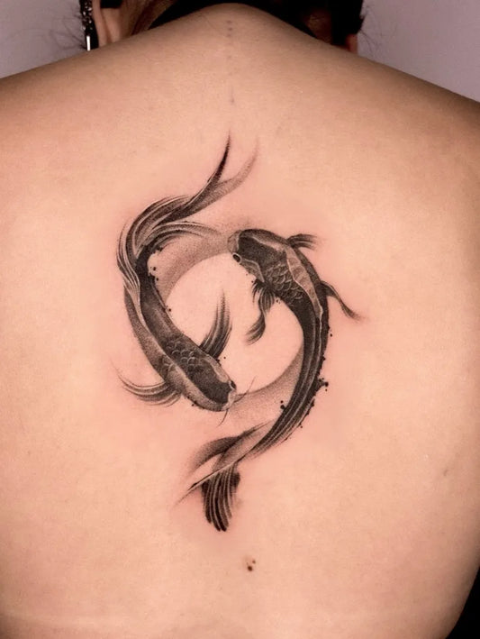 Medium Blackwork Two Koi Fish Tattoo on Women Back by @unknown.museum