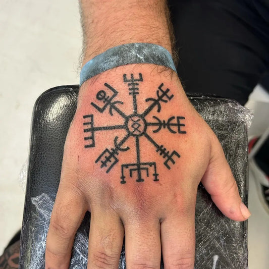 Medium Blackwork Vegvisir Tattoo on Men Hand by @bluelinetattoo