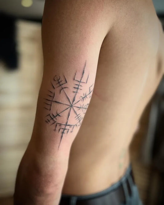 Medium Blackwork Vegvisir Tattoo on Men Upper Arm by @strigaartist