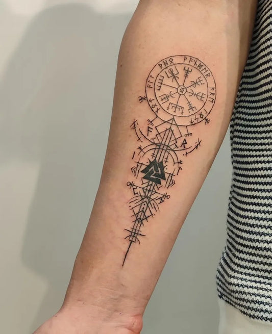 Medium Blackwork Vegvisir and Runes Tattoo on Men Arm by @boxartboxtattoo