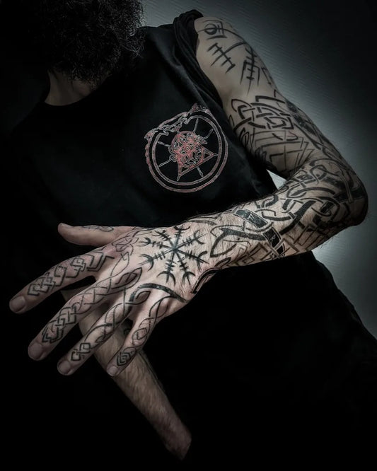 Medium Blackwork Vegvisir and Runes Tattoo on Men Arm by @lowenn.art