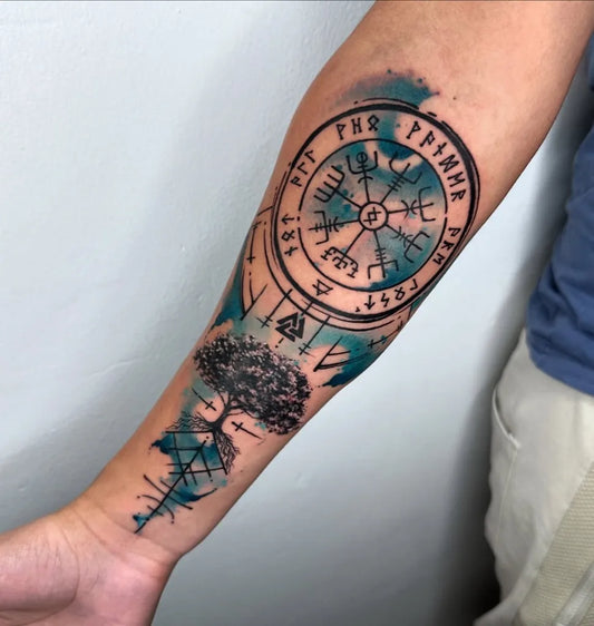 Medium Blackwork Vegvisir and Yggdrasil Tattoo on Men Arm by @yokaitattoo