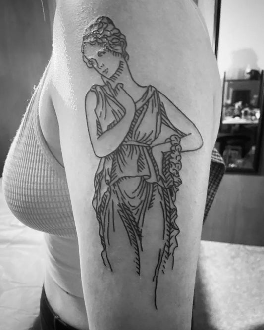 Medium Blackwork Venus Figure Tattoo on Women Bicep by @anorsulli