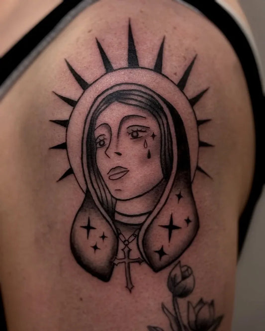 Medium Blackwork Virgin Mary with Rose Tattoo on Women Shoulder by @gracegonzalezartistry