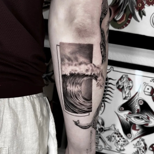 Medium Blackwork Wave Tattoo on Men Arm by @noodletattoo